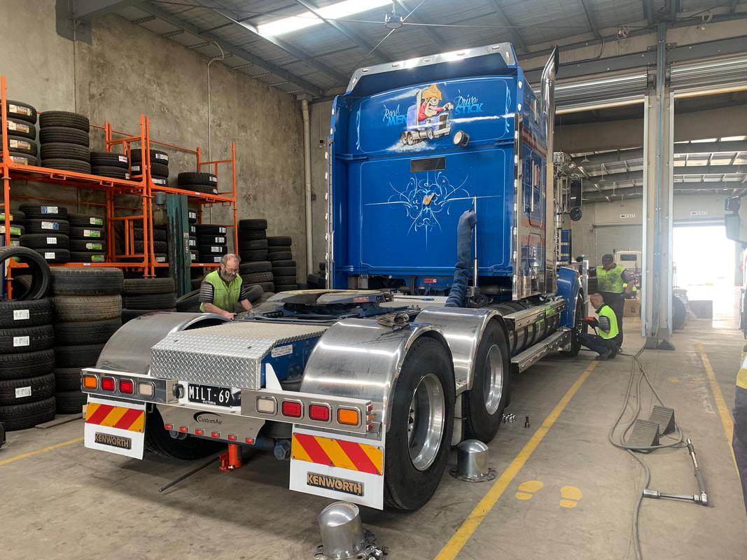 Routine Truck Tyre Maintenance Being Carried Out